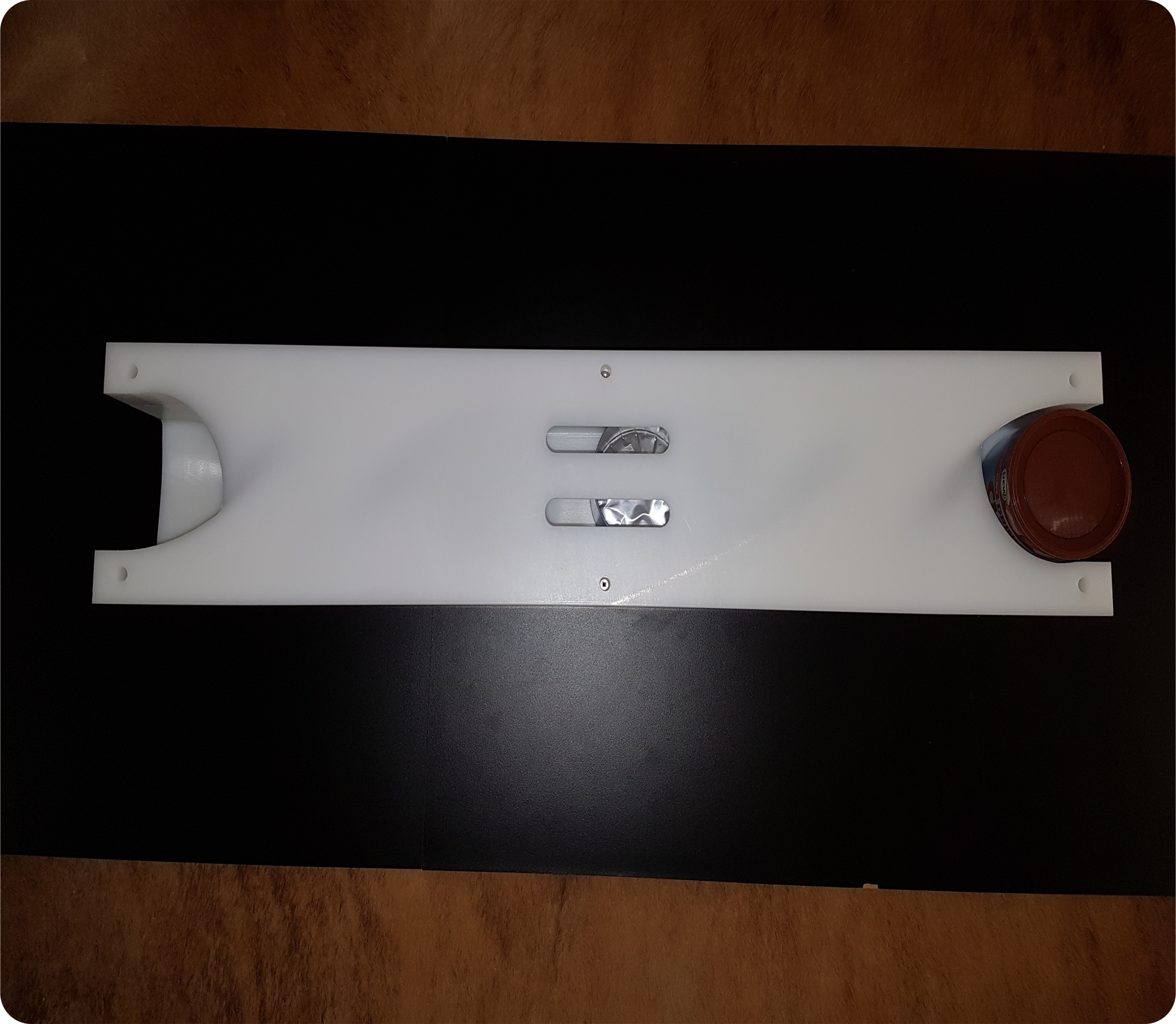 Food tin being turned upside down to be rinsed and then turned once more to be upright once again